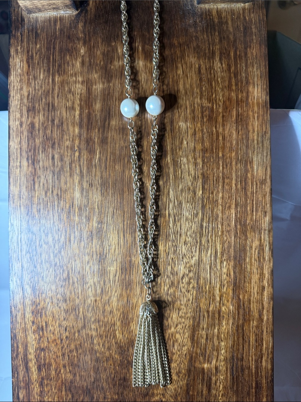 Vintage looking gold tone pearl pendant with tassel